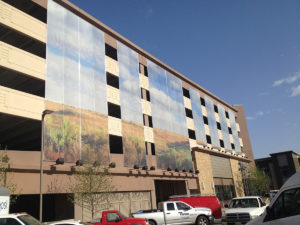 Facade on exterior of parking garage.