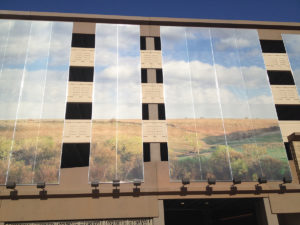 Facade on exterior of parking garage.